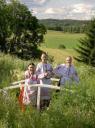 The soloists of the Ensemble Victoria Vodopyanova, Marina Batrakova and Anna Kishman in the Finnish countryside