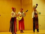 During the concert in Evijärvi. Valentyna Makhnyk (singer and percussion), Maryna Zhulenova (cobza) and Ievgen Valovenko (double-bass)